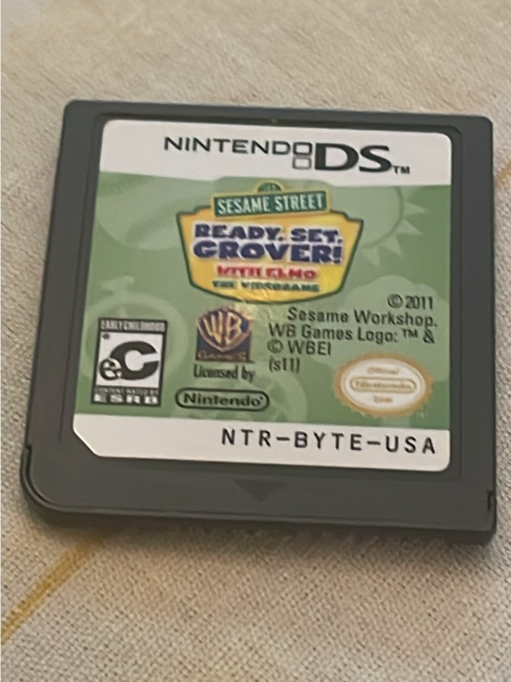 Nintendo DS Game Cartridge with Green and White Sesame Street Label